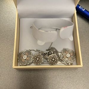 Silver necklace, bracelet and earrings